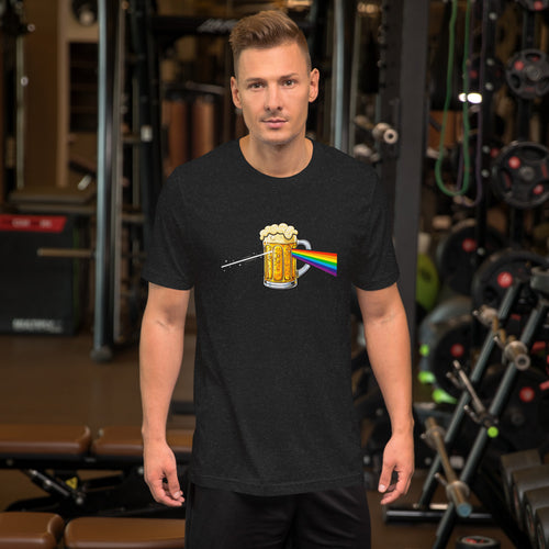 Male model in a gym setting wearing a black heather t-shirt with a prism parody design where a beer mug creates a rainbow, perfect for craft beer and rock music fans.